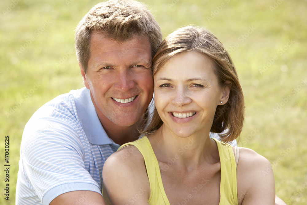 Middle aged couple having fun in countryside Middle aged couple having fun in countryside