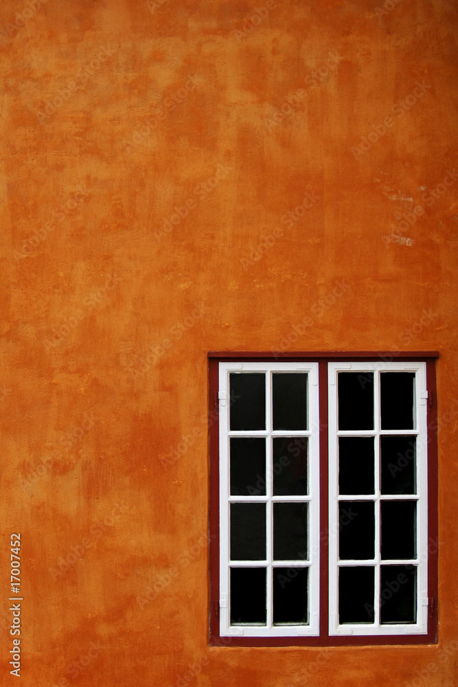 Fototapeta premium Orange wall and window