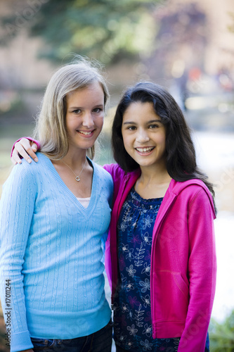 Pre Teen Girls Smiling To Camera