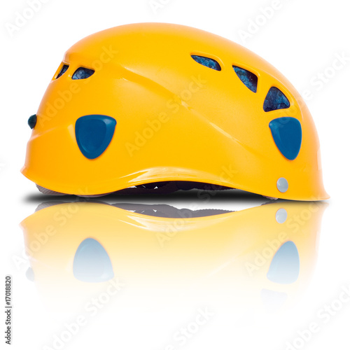 left side view of orange climbing helmet