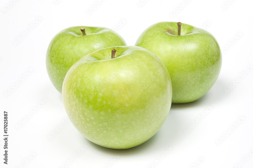 Three green apples, isolated on white