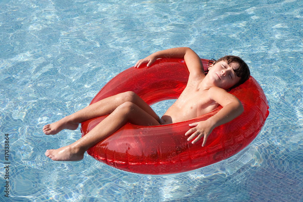 relaxed child in the pool
