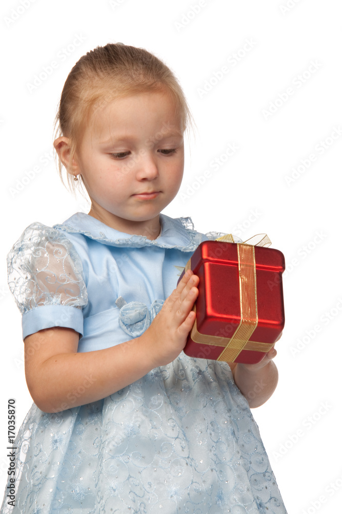The beautiful little girl with gift The beautiful little girl with gift