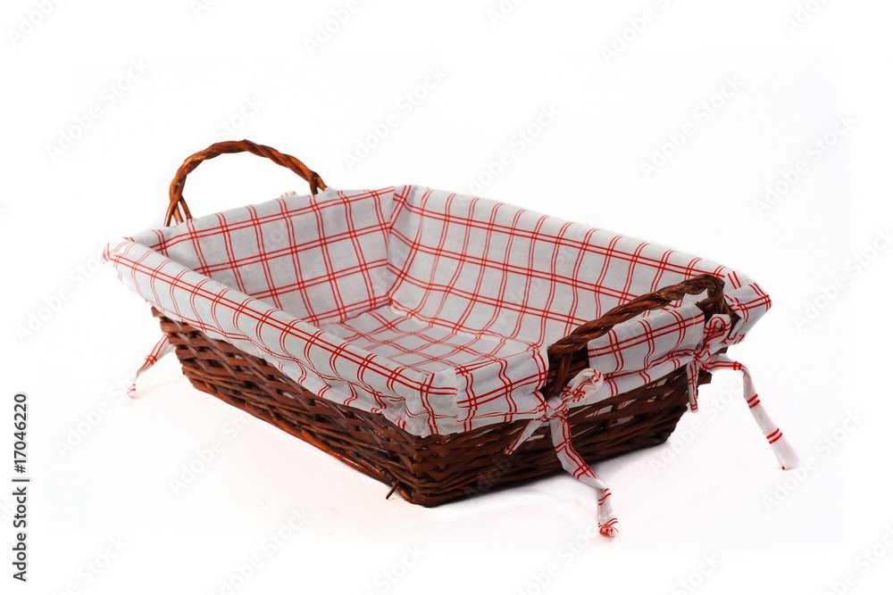Bread basket at angle isolated over white Bread basket at angle isolated over white
