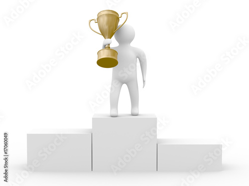 winner with gold cup on whi...