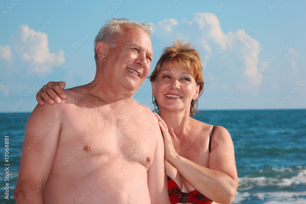 portrait of aged pair against sea portrait of aged pair against sea