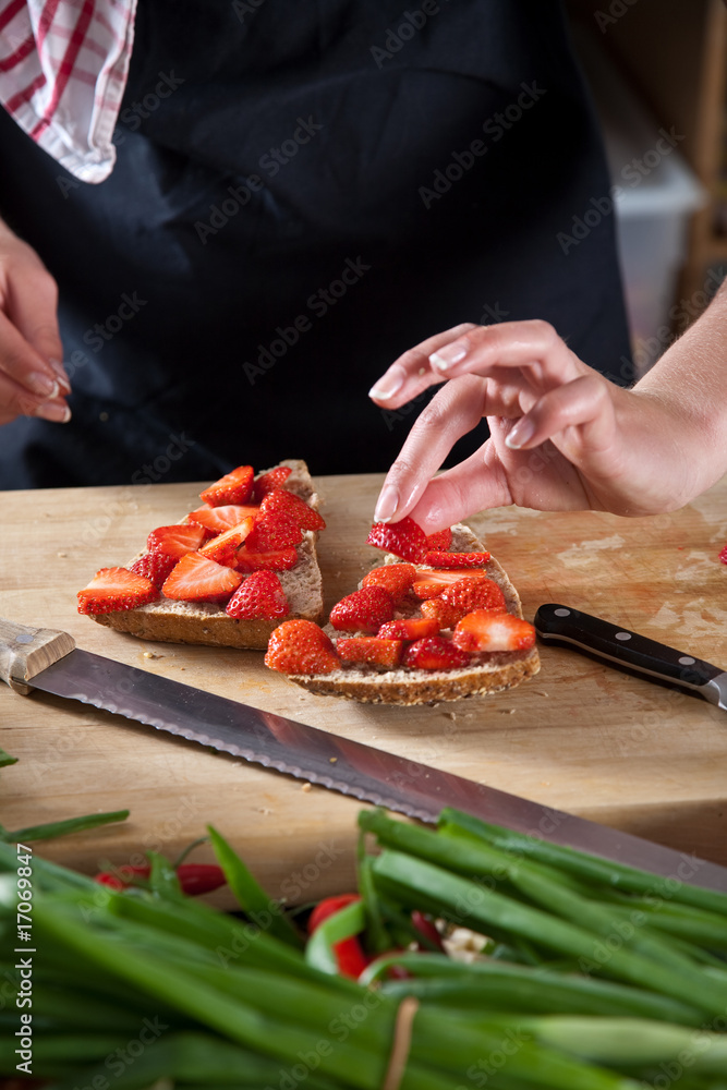 Making a strawberry sandwich Making a strawberry sandwich