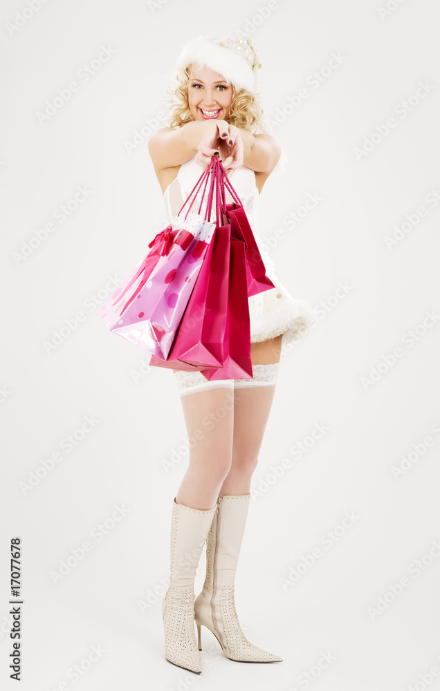 santa helper with pink shopping bags