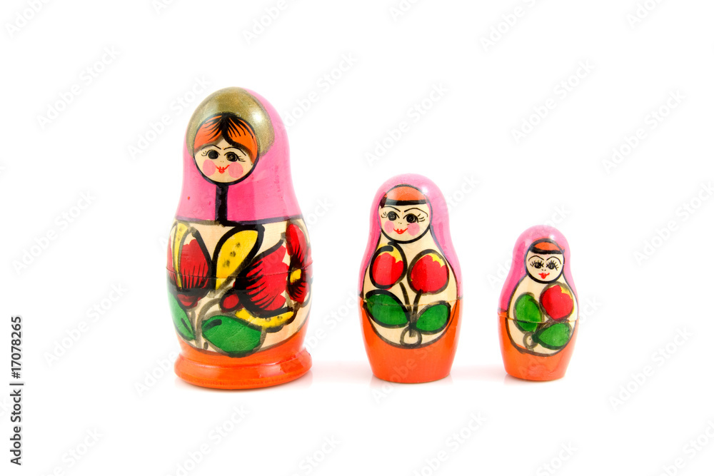 Wooden Russia matryoshka dolls over white background
