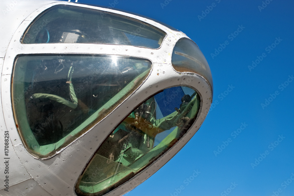 airplane pilot cabin nose with windows and equipment