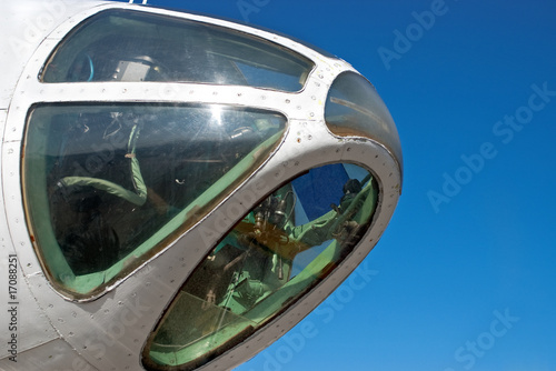 airplane pilot cabin nose with windows and equipment © liubomirt
