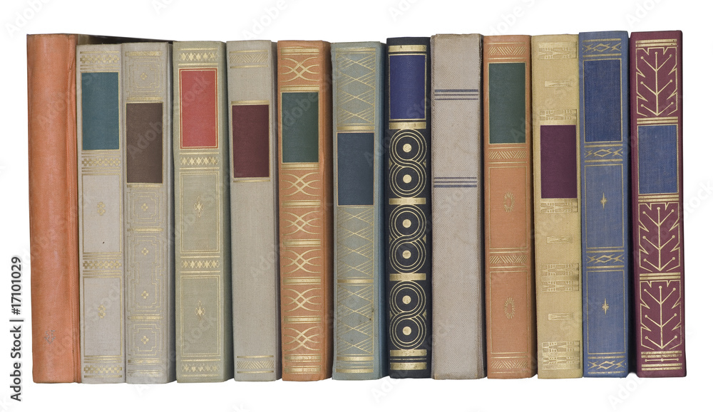 Naklejka premium vintage books in a row, isolated, free copy space