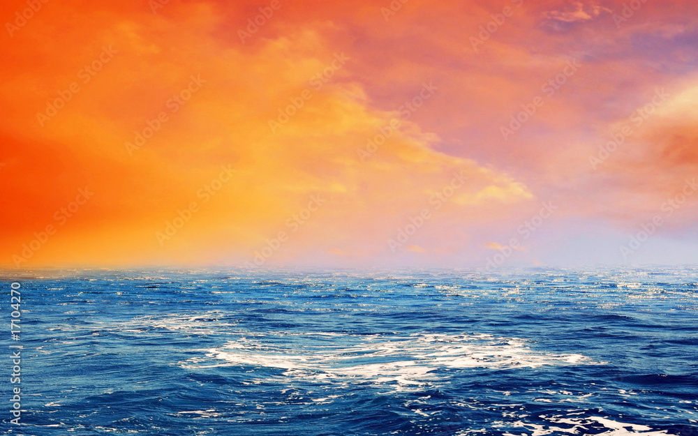 Orange And Blue Sky On The Sea