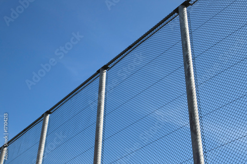 Big wire chain security fence.