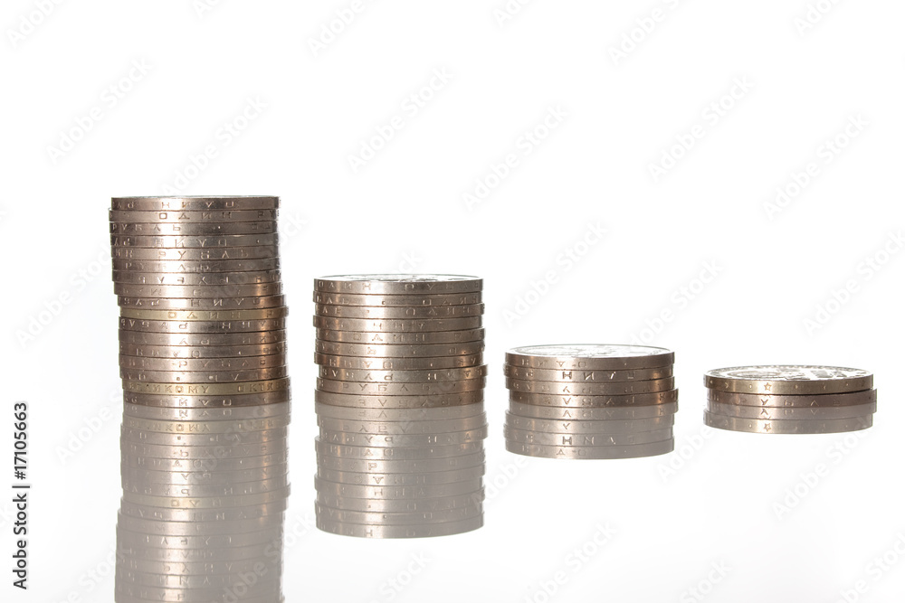 Columns of coins isolated on white color Columns of coins isolated on white color