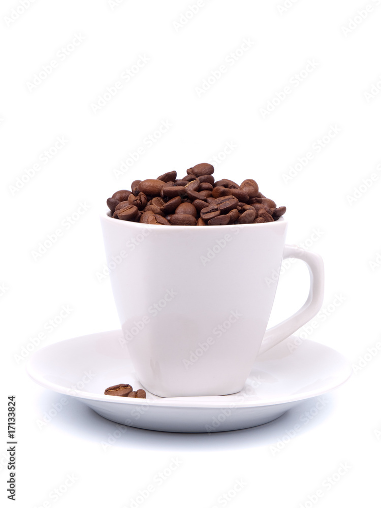 Cup and saucer with coffee beans Cup and saucer with coffee beans