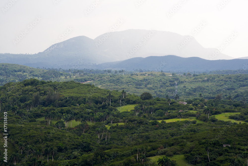 Naklejka premium Tropical valley with high mountains