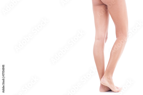 Weibliche Beine von hinten gehen aus Bild photo