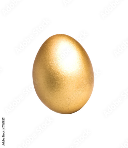 Golden egg isolated on white background.