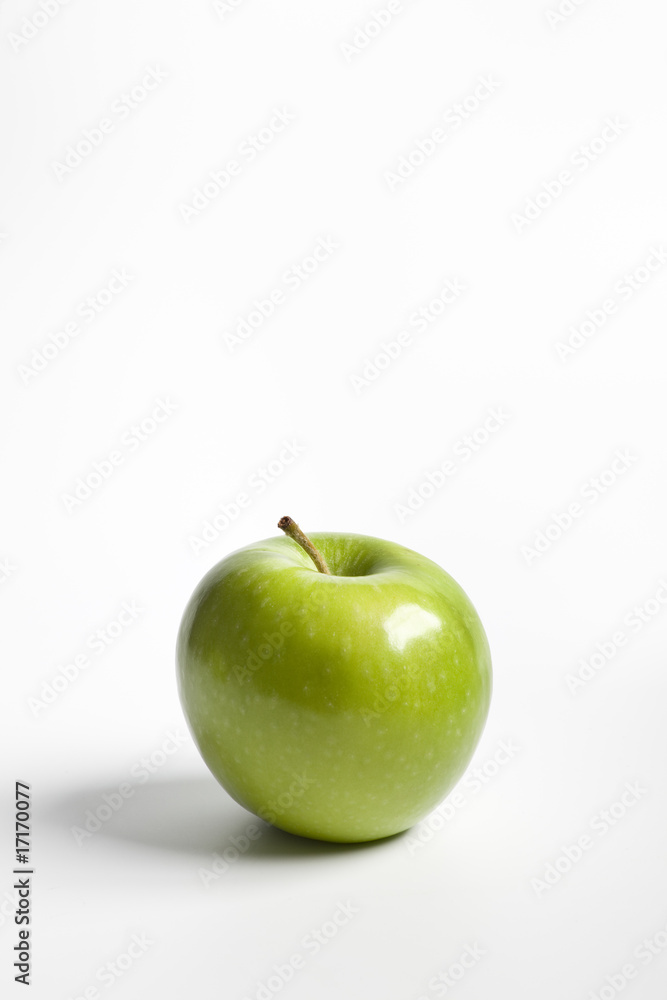 One single green apple