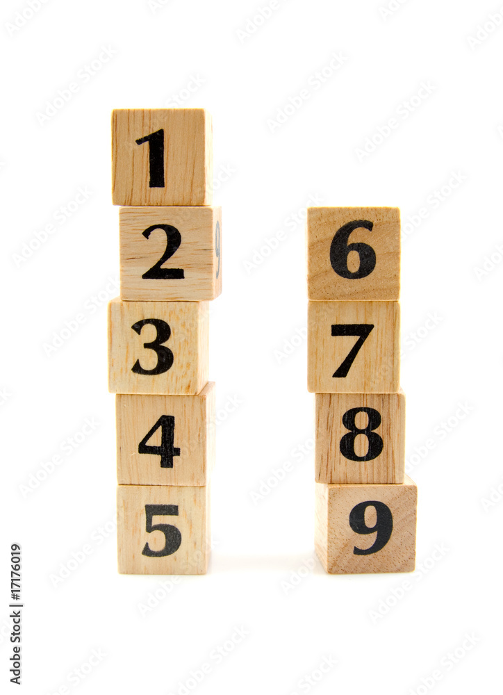 stacked wooden blocks with numbers over white background stacked wooden blocks with numbers over white background