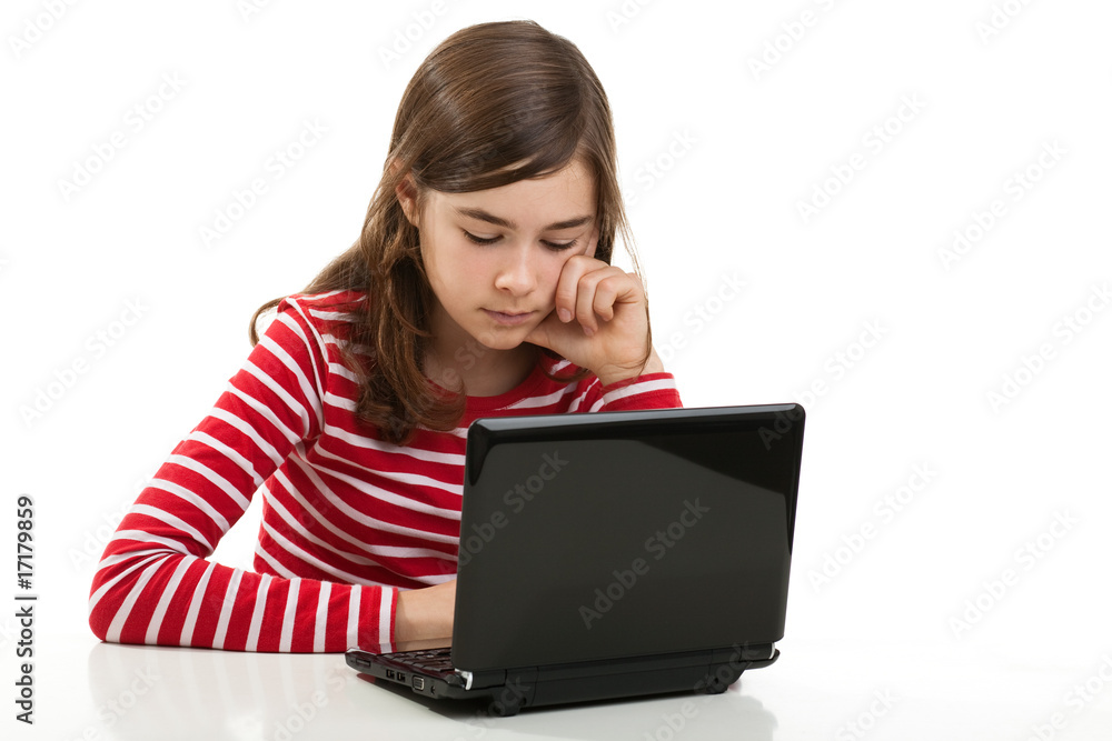 Girl using laptop isolated on white background Girl using laptop isolated on white background