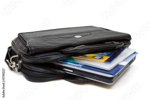 Black leather computer bag with laptop and folders