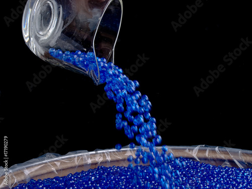 Pouring Plastic Colored Beads photo