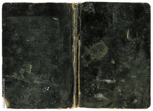 Antique open book or notebook with dirty scratched black linen cover