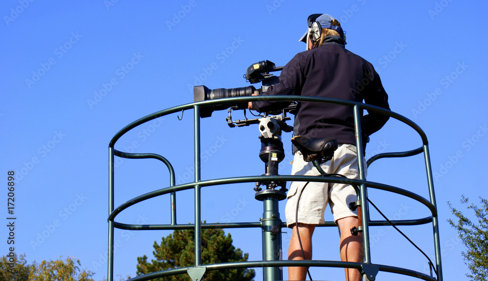 Cameraman de la télévision en tournage Cameraman de la télévision en tournage