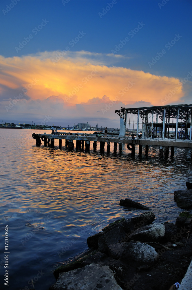 Fototapeta premium Abandoned pier at sunset