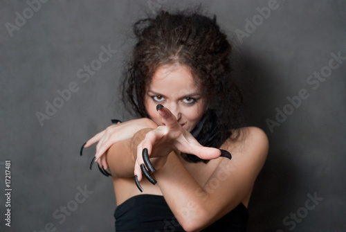 witch with black nails