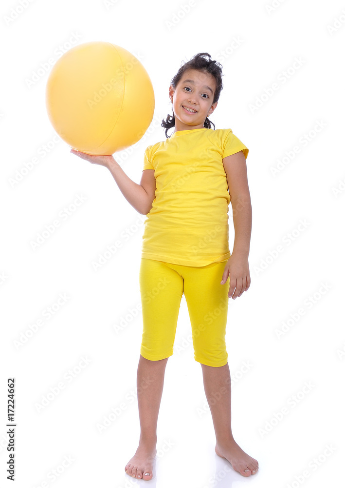 Little beautiful girl in yellow with yellow ball Little beautiful girl in yellow with yellow ball