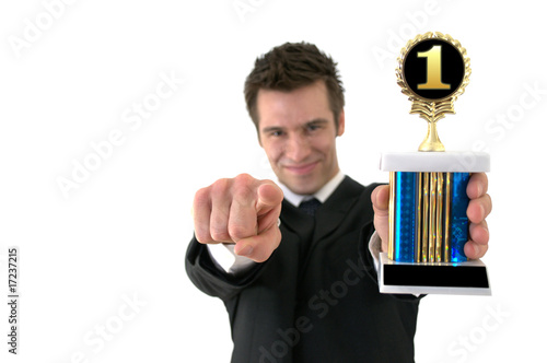 Number one: Successful young man with a trophy