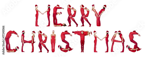 Group of red dressed people forming the phrase  Merry Christmas 