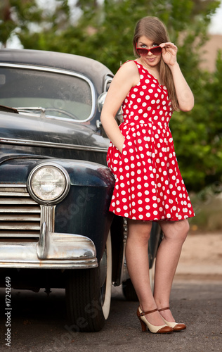Girl in red with vintage car © Scott Griessel