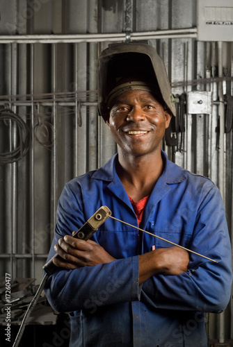 African welder with mask
