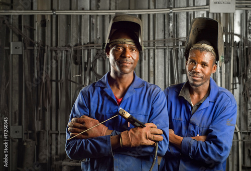 African welder with mask