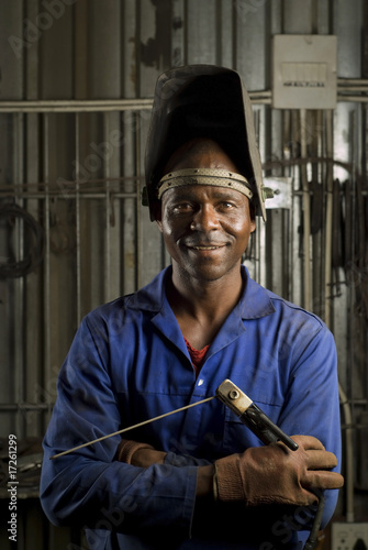 African welder with mask