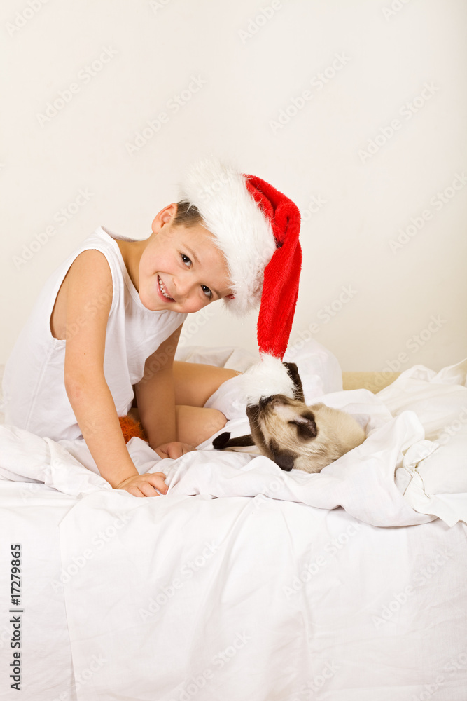 Boy with his cat waiting for christmas