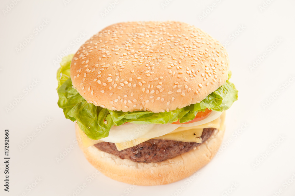 Fresh homemade Beef tomato cheese onion burger isolated Fresh homemade Beef tomato cheese onion burger isolated