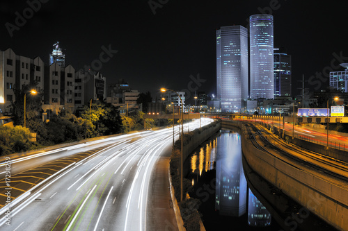 Night view of Azrieli complex and Ayalon Highway in Tel Aviv photo