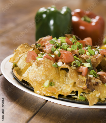 nachos cheese on table wood