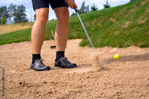 golf shot in sand