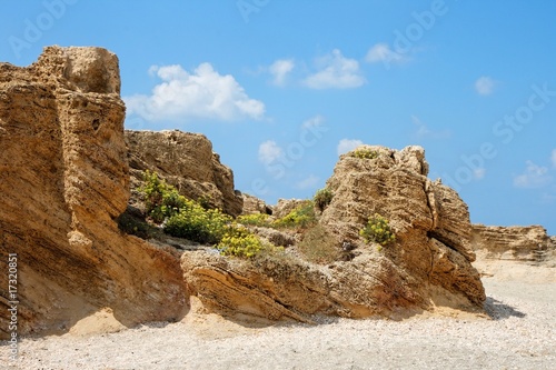 Scenic weathered rock in desert in bright summer day