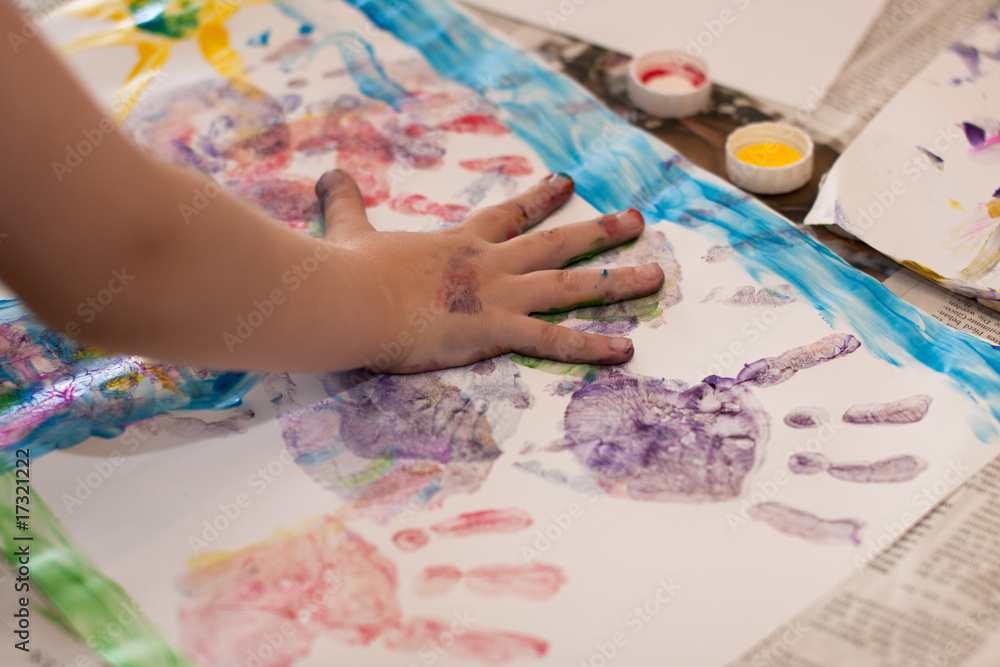 Little Children Hands doing Fingerpainting Little Children Hands doing Fingerpainting