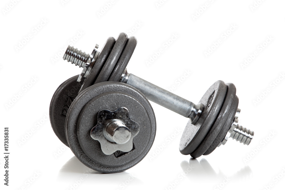 Naklejka premium Set of Weightlifting dumbbells on a white background
