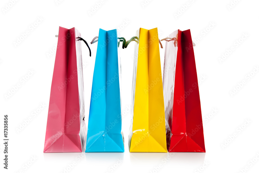 Group of colorful shopping bags on white