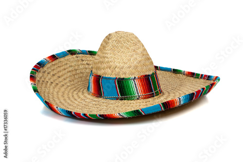 Straw Mexican Sombrero on white background photo