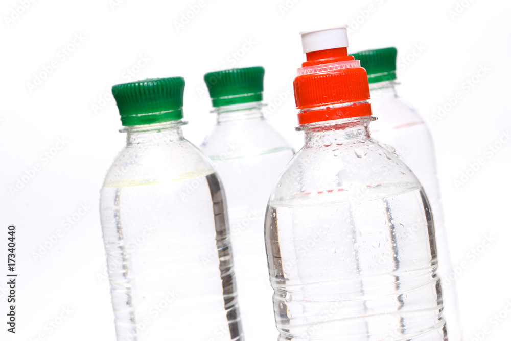 Plastic bottles of mineral water isolated on white background Plastic bottles of mineral water isolated on white background